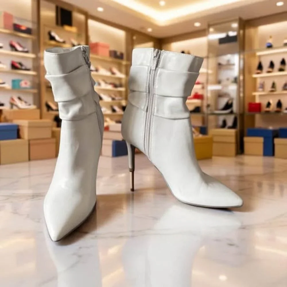 MARC FISHER IVORY HEELED BOOTIES